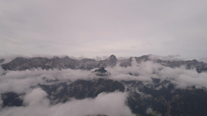 Fototapeta na wymiar Epic Mountain Clouds Mist in Austria at Sunset Sunrise