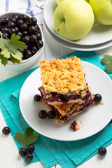 Slices of homemade pie with berry filling.