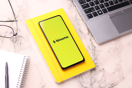 Assam, india - July 28, 2020 : Binomo a easy online stock trading app.