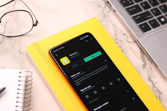 Assam, india - July 28, 2020 : Binomo a easy online stock trading app.