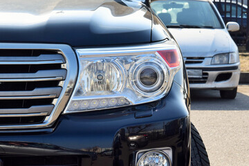 headlight of a modern black car
