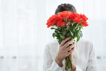 girl holding flowers in her hands
