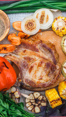 grilled piece of meat with vegetables. Corn, onions, carrots, spices, bell peppers, zucchini. Barbecue in open air.