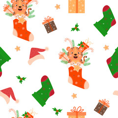 Seamless pattern with tiger and New Years decor. Cute tiger cub with gift and chocolates in a red Christmas sock on white background with a Santa hat, gingerbread and mistletoe. Vector illustration