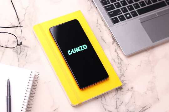 West Bangal, India - August 21, 2021 : Dunzo logo on phone screen stock image.
