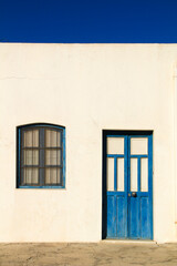 Typical Andalusian whitewashed facade in Almeria, Spain