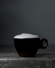 
a cup of coffee with thick foam - 457906118
