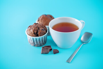 Sweet fresh chocolate muffins with chocolate slices