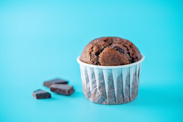 Sweet fresh chocolate muffins with chocolate slices