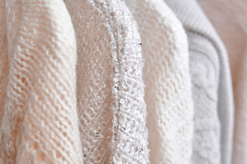Obraz premium Close up of cozy warm sweaters copy space 