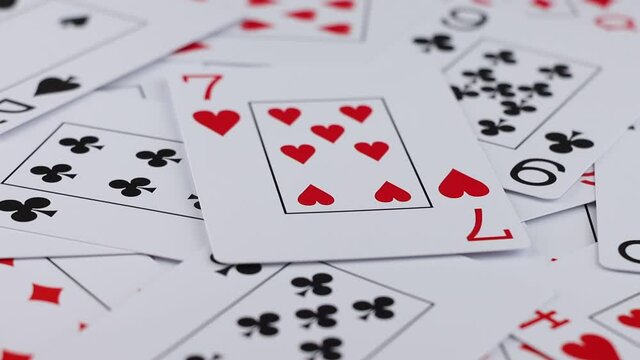 Rotating playing cards - close up view.