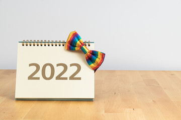 2022 calendar and rainbow bow tie - symbol of LGBT society