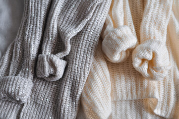 Fototapeta na wymiar Close up of cozy warm sweaters copy space 