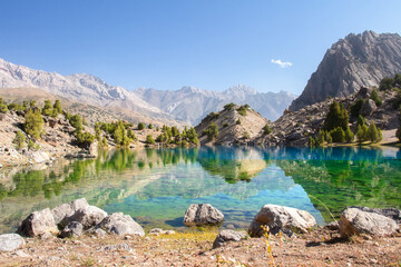 Fototapeta na wymiar Scenic view on Alaudin lake in Fann moutains. The journey on beutiful places of Fann moutains in Tajikistan. 