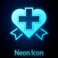 Glowing neon Heart with a cross icon isolated on brick wall background. First aid. Healthcare, medical and pharmacy sign. Vector