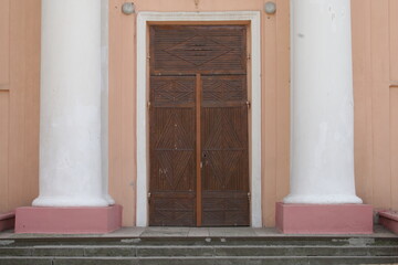 Vintage wooden door and columns