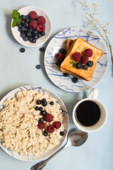 oatmeal porridge with milk, cereals, toast, coffee for breakfast