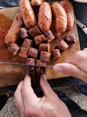 sausage in the hand
