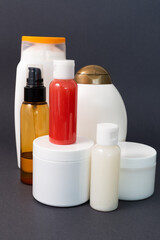Set of various health care and spa white bottles. Body oil, lotion, serum, shower gel and shampoo