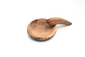 Wooden mortar and pestle (Cobek and Ulekan) is an Indonesian Kitchen utensil for making Sambal or spicy sauce. Mortar and pestle isolated on white background.