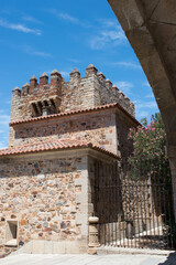 Vertical shot of a famous restaurant under the sunlight in Caceres, Spain