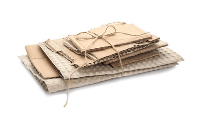 Tied pieces of cardboard on white background