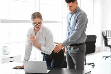 Boss harassing his secretary in office