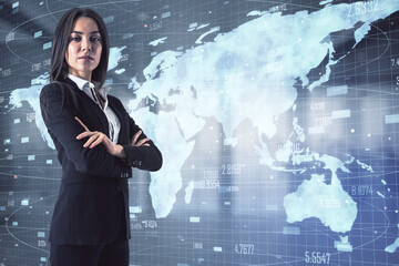 Attractive young european businesswoman standing in blurry office interior with glowing map hologram. Communication and global big data concept. Double exposure.