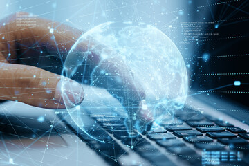 Close up of hands using laptop computer with abstract globe sphere with coding and polygonal network. Future, technology and digital world concept. Double exposure.