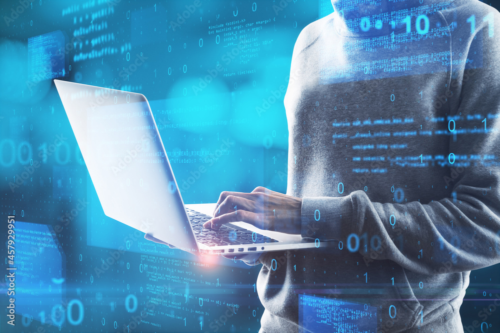 Aufkleber Hacker in hoodie using laptop computer with abstract glowing blue coding background. Binary code, theft, technology, data and internet concept. Double exposure.