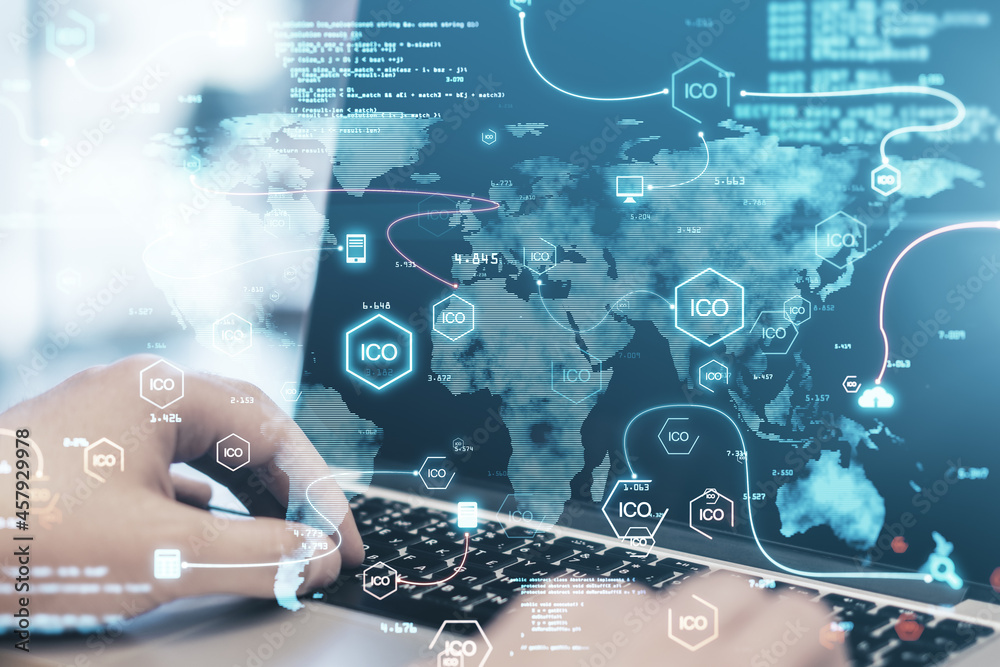 Poster Close up of hands using laptop with creative glowing ico hologram with icons and map on blurry background. Initial coin offering and cryptocurrency concept. Double exposure.