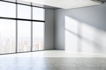 Fototapeta premium Simple empty concrete room interior with windows, city view, sunlight and shadows. 3D Rendering.