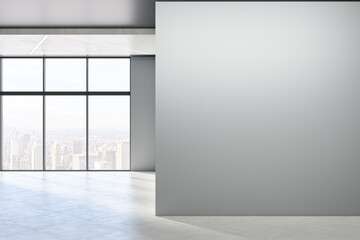 Modern empty concrete room interior with blank mock up place on wall, windows, city view, sunlight and shadows. 3D Rendering.