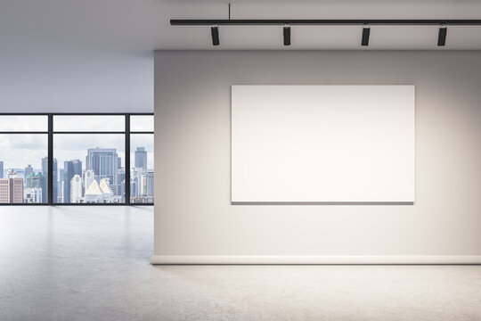 Blank wall with mock up poster in modern office interior with window and city view. 3D Rendering.