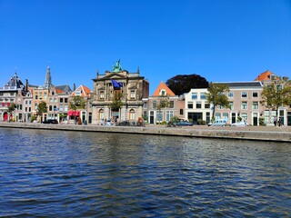 Fototapeta na wymiar Haarlem, Amsterdam, Netherlands - September 2021 - Water channel in the city center of Haarlem