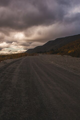 The road goes into the distance to the mountains 
