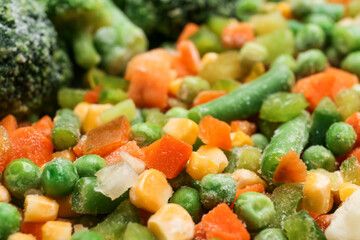 Different frozen vegetables as background, closeup