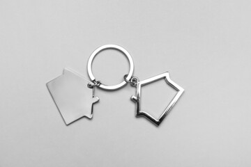 House shape keychain on grey background