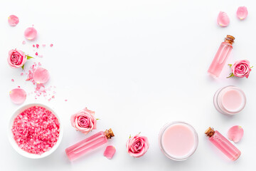 Essential rose oil with cosmetic products for skin care