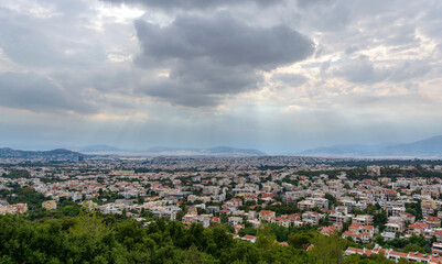 Fototapeta na wymiar Panoramic view of cloudy Athens, taken shot from Penteli mountain.