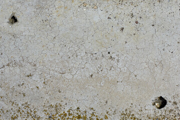 Old grey concrete wall with concrete texture for background. Front view with copy space.