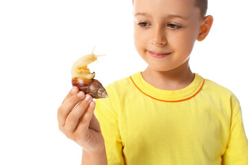 Cute little boy with snail on white background