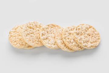 Puffed rice crackers on white background