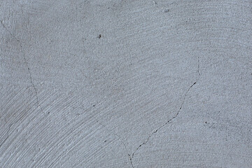 Plastered gray wall  texture. Gray wall background. Front view with copy space.
