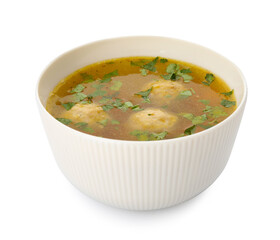 Bowl with tasty meatball soup on white background