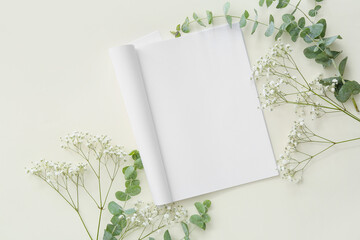 Blank magazine with floral decor on light background