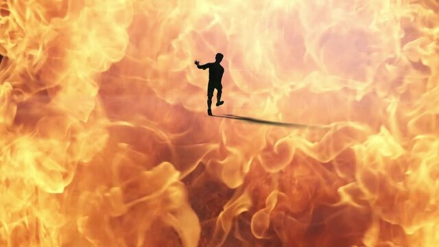 3d render of silhouette soccer player in thick fog shooting penalty or free kick in slow motion when burning fire and flames suddenly fill the screen in surreal atmosphere