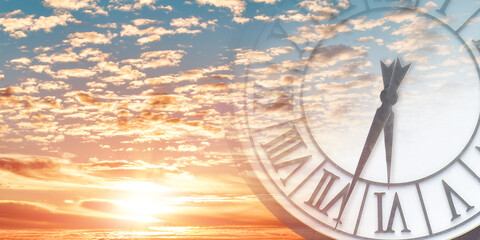 Double exposure of clock face in sunset sky. Time passing concept.