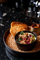 Fine dining tartar in a restaurant with a fancy serving