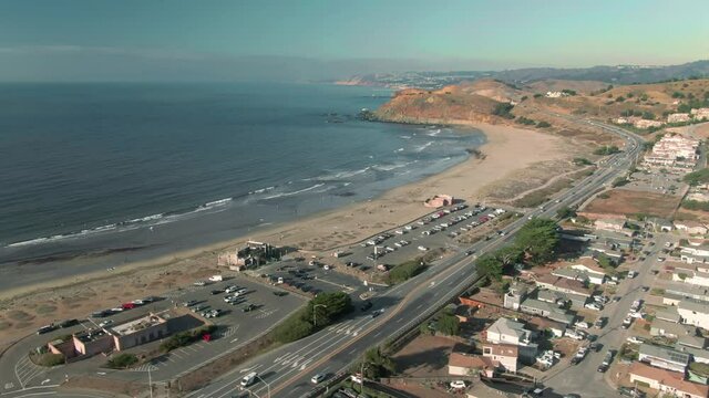 Aerial: The beach and town of Pacifica, California, USA